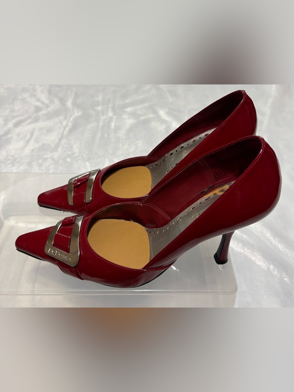 BCBGirls Red Patent Pointed-Toe Pumps with Silver Buckle